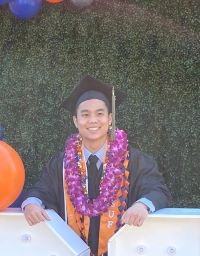 This is a photo of the amazing Bryan Nguyen graduating from California State University Fullerton